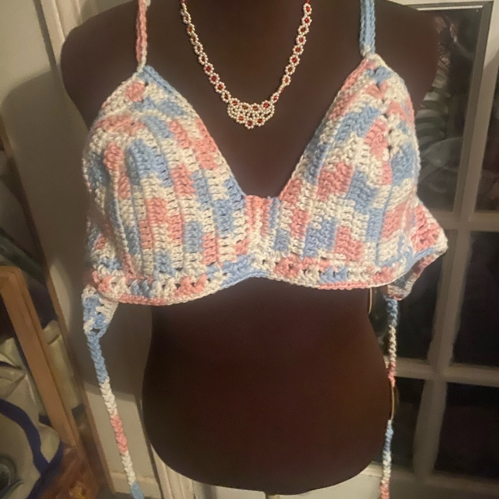 Woman’s crocheted tanks n swimming tops n more